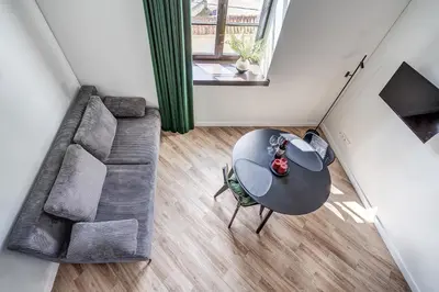 an overhead view of a living room with a table and a couch at Angel House Vilnius, Old Town 6 in Vilnius