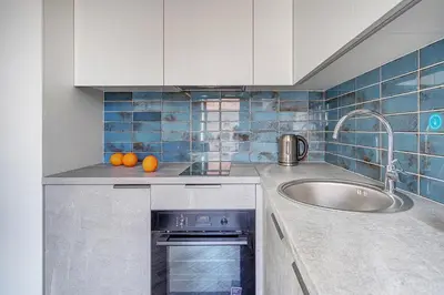 a kitchen with a sink and a counter top at Angel House Vilnius, Old Town 6 in Vilnius