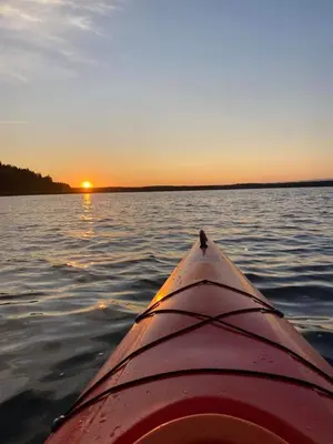 a view of the back of a boat in the water at ForrestVila in Karačiūnai