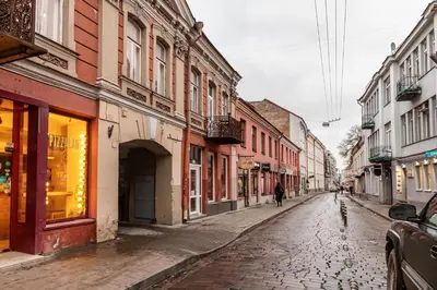 an empty street in an old town at Lovely apartment Traku str. in Vilnius