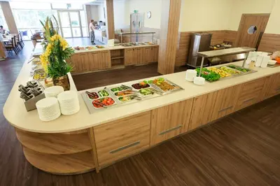 a buffet in a restaurant with many plates of food at Medical SPA 
