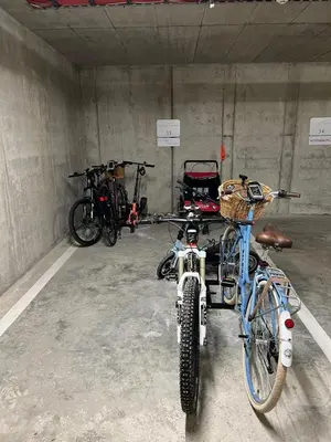 a group of bikes parked in a garage at Pink Peony in Druskininkai