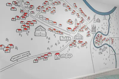 a map of a city on a wall at Vilnius Old Town apartment in Vilnius