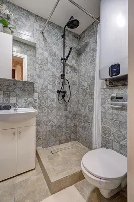 a bathroom with a toilet and a sink at Mini apartament by Town hall, self chek-in in Vilnius