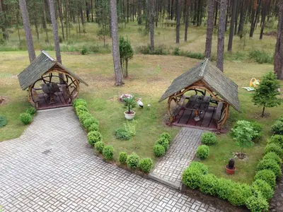 an aerial view of a garden with two gazebos at El Arm El in Druskininkai