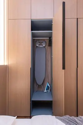 a small room with a bed inside of a cabinet at cohost I New Bastėja Life Apartments w-Garage Prkg & Self Check-in in Vilnius