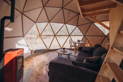 a living room in a geodesic dome house at VasaRojaus Kupolai in Birštonas