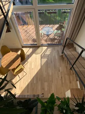 an overhead view of a patio with a table and chairs at Vilnius Cozy Loft in Vilnius