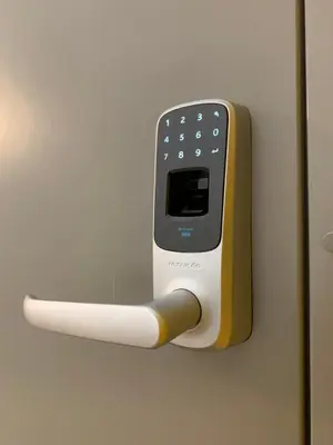 a remote control is attached to a wall at Park Apartments in Druskininkai
