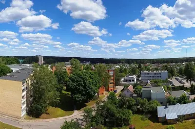 an aerial view of a city with trees and buildings at Cozy apartments in Druskininkai with panorama view in Druskininkai