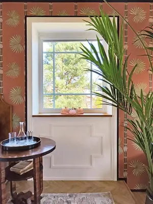 a window in a room with a table and a plant at Suite with private bathroom at three bedroom interwar Villa Grabyte with daily spaces to share by pine forest on the bank of the river- 8min by car from old town in Kaunas