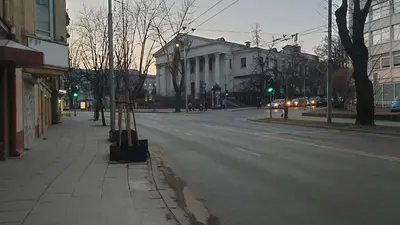 an empty city street with a green traffic light at kauno street home in Vilnius