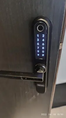 a remote control sticking out of a microwave oven at HaPPy Inn VIP, Self Check-In-24x7, A-C, Parking-in-the-underground-Garage in Vilnius
