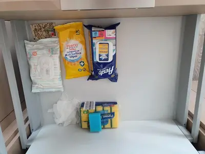 a corner of a closet with some food and groceries at 2-bedrooms apartment in city center Šiauliai in Šiauliai