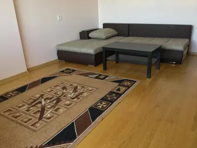 a living room with a couch and a coffee table at 2 Kambariu butas.Apartments-in the city UKMERGE. in Ukmergė