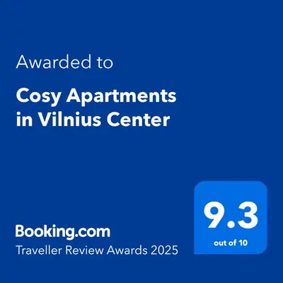 a blue screen with the text awarded to cosy appointments in vitillin center at Cosy Apartments in Vilnius Center in Vilnius