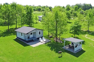 an overhead view of a tiny house with a gazebo at 5 Nameliai in Kudariškės