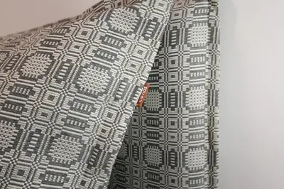 a black and white patterned shirt with a red zipper at Sonatina apartment in Druskininkai