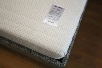 a white mattress with a price tag on it at Sonatina apartment in Druskininkai