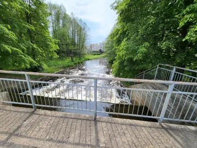 a view of a river from a bridge at Alka Lake Inn in Druskininkai