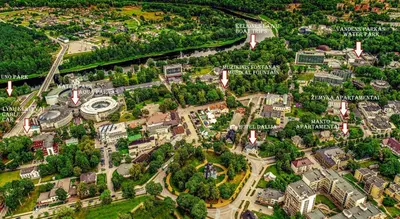 an overhead view of a city with trees and buildings at Žemyna Apartmentai in Druskininkai