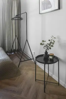 a living room with two tables and a couch at MINDAUGO VILOS in Piliuona