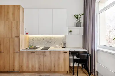 a kitchen with a sink and a counter at Air Apartments - Code entry only, No staff in Vilnius