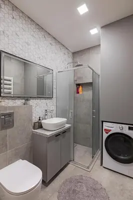 a bathroom with a toilet and a sink and a shower at TOP located NEW Stylish apartment in Vilnius Old Town in Vilnius