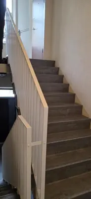 a staircase in a building with a stair case at TOP located NEW Stylish apartment in Vilnius Old Town in Vilnius