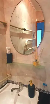a bathroom with a sink and a mirror at Krymo g. Lovely 2 room flat in Šiauliai, near Akropolis in Šiauliai