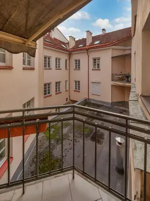 a view of the courtyard from the balcony of a building at Old town, Bright, Peaceful, Balcony, Netflix in Vilnius