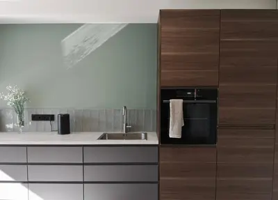 a kitchen with a sink and a microwave at Hill Top apartment in central Kedainiai in Kėdainiai