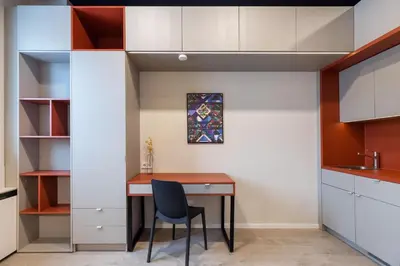 a study room with a desk and a chair at Youston self check-in coliving Vilnius in Vilnius