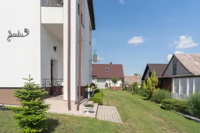 a view of the courtyard of a house at Dvi liepos in Merkinė