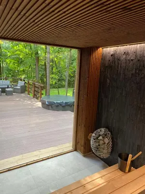 a view of a deck from the outside of a house at Forest relax in Svedai