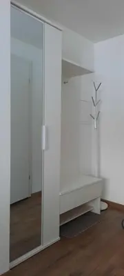 a white room with a glass wall at Butukas in Anykščiai
