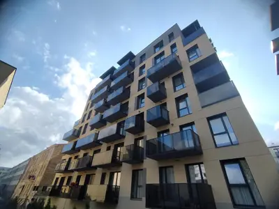 a building with balconies on the side of it at Brand New Mindaugas Luxury Designer Apart in Vilnius