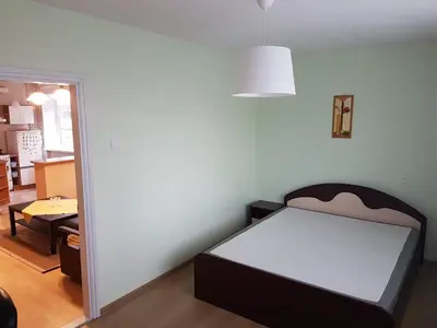 a bedroom with a bed in a room at Apartments in Panevezys city center in Panevėžys