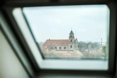 a view of a building from a window at #stayhere - Spacious Luxury Town Hall 3BDR Apartment in Vilnius