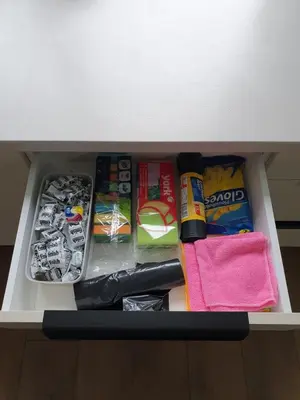 a drawer with food and other items in it at Talsa 1-bedroom apartment in city center Šiauliai in Šiauliai