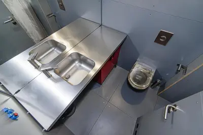an overhead view of a bathroom with two sinks at Hidden Submarine in Vilnius