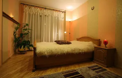 a bedroom with a bed and a window at Neravu namai in Druskininkai