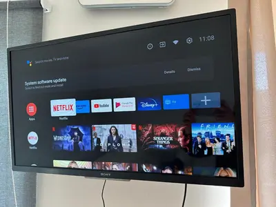 a television screen with a website on it at New Ozas flat in Vilnius