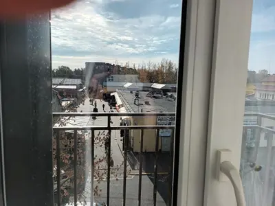 a view of a city from a window at Skaistakalnio apartamentai in Panevėžys