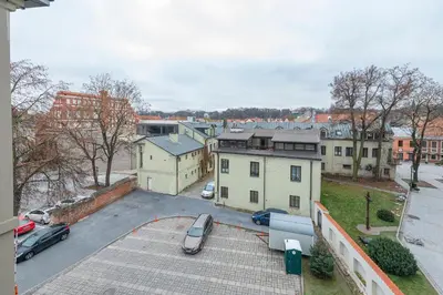 an aerial view of a parking lot in a city at Archcathedral studio apartment by Polo Apartments in Kaunas