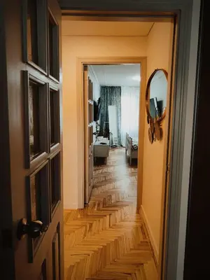 a view of a hallway from a room with a door at Pakeliui in Kaunas