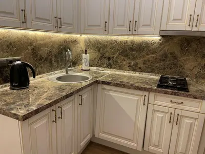 a kitchen with a sink and a counter top at Vilnius City Walls apartment in Vilnius