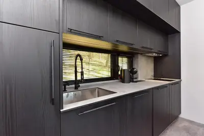 a kitchen with a sink and a window at Premium Forest Bungalow with Ofuro Tub in Luokesos Sen