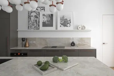 a kitchen with a table with green objects on it at IVIS House - Spacious Apartment with Terrace, Vilnius Old Town in Vilnius