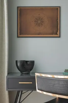 a table with a bowl on it and a picture on the wall at IVIS House - Spacious Apartment with Terrace, Vilnius Old Town in Vilnius